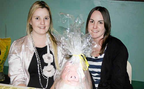 Tina Johnson (left) and Amy Wilson with their pig biscuit barrel win at the Monster Cent Sale. Tina Johnson (left) and Amy Wilson with their pig biscuit barrel win at the Monster Cent Sale.